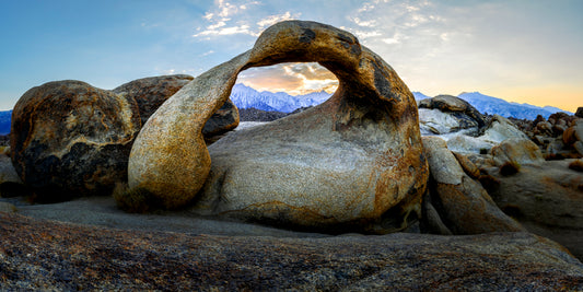 Mobius Arch framing Sierra Nevada mountains at sunrise in Alabama Hills, fine art desert landscape by Beau Jesse Johnston.