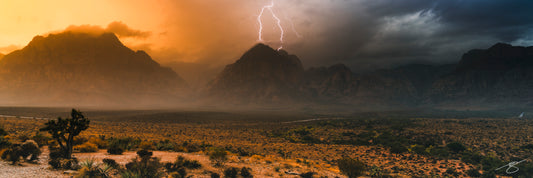 Lightning strikes Red Rock Canyon desert under monsoon skies – fine-art landscape by Beau Jesse Johnston.