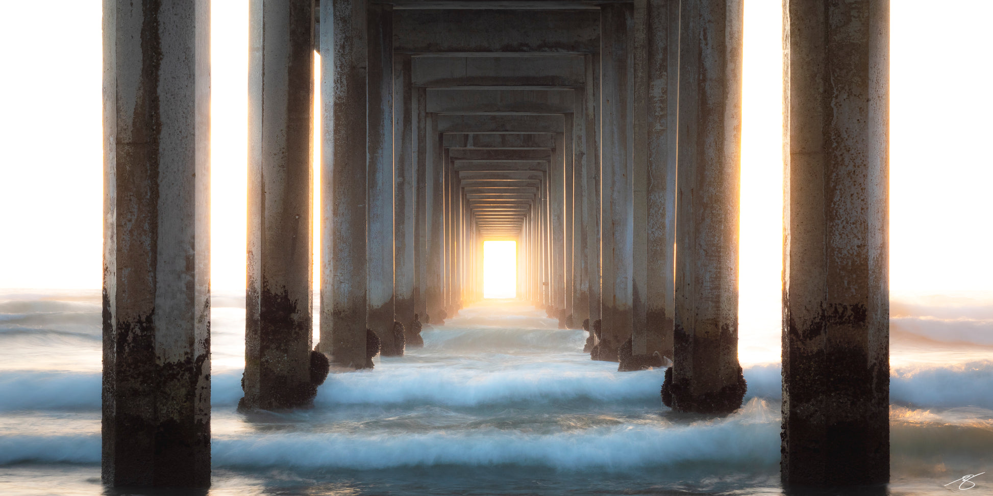 Fine art photo of sunset under Scripps Pier in La Jolla, California by Beau Jesse Johnston, ocean wall art.