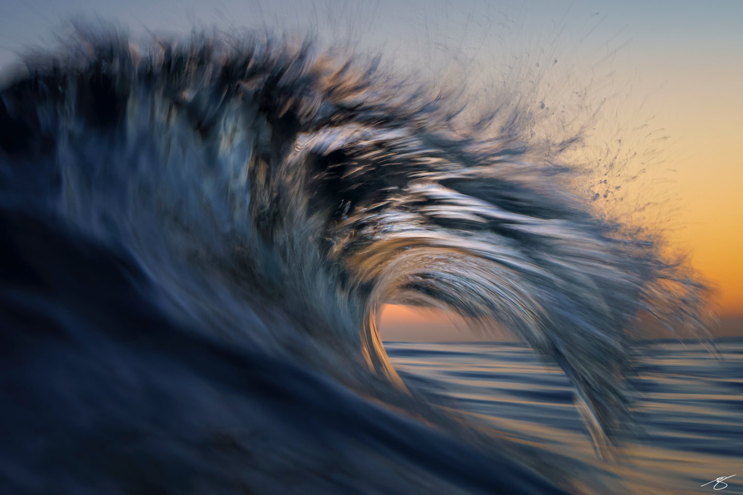 Fine art wave photograph at sunrise, abstract ocean motion captured by Beau Jesse Johnston from inside the surf.