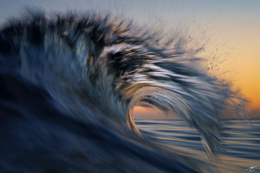Fine art wave photograph at sunrise, abstract ocean motion captured by Beau Jesse Johnston from inside the surf.