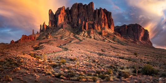 Superstition Mountains glowing at sunset in Arizona desert, fine art landscape photography by Beau Jesse Johnston.