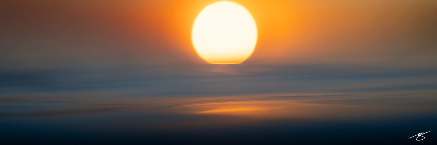 Abstract fine art ocean photo of glowing sun over horizon by Beau Jesse Johnston, minimalist seascape wall art.