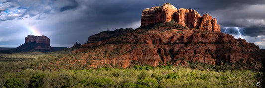 Lightning and rainbow over Cathedral Rock in Sedona, Arizona — fine art landscape photo by Beau Jesse Johnston.