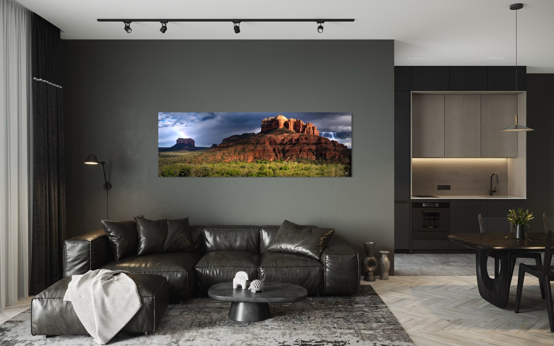 Modern living room with a large TV displaying a nature scene, leather sofa, and dining table.