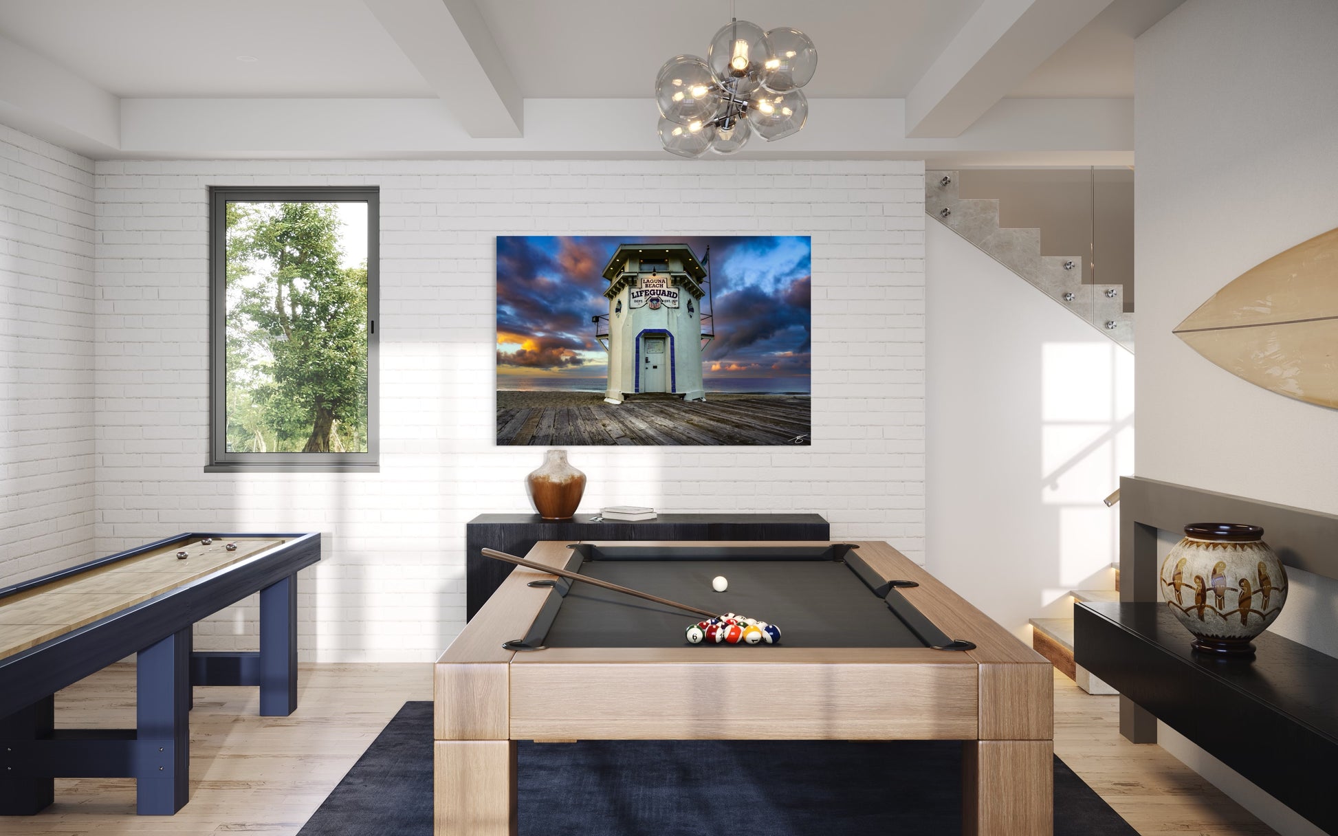 A dramatic coastal sunrise over the historic Laguna Beach lifeguard tower. Vibrant clouds, ocean light, and Southern California charm in a fine art print.