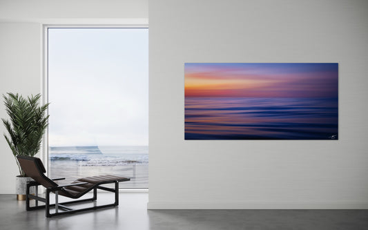 A soft, abstract ocean sunset blending violet, blue, and golden tones. A calming minimalist seascape print for collectors seeking modern coastal art.