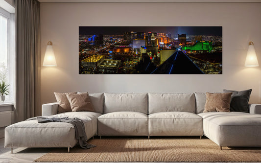 A sweeping night panorama of the Las Vegas Strip captured from the Luxor Pyramid. Brilliant neon, glowing hotels, and vibrant city lights create a dynamic fine art scene.