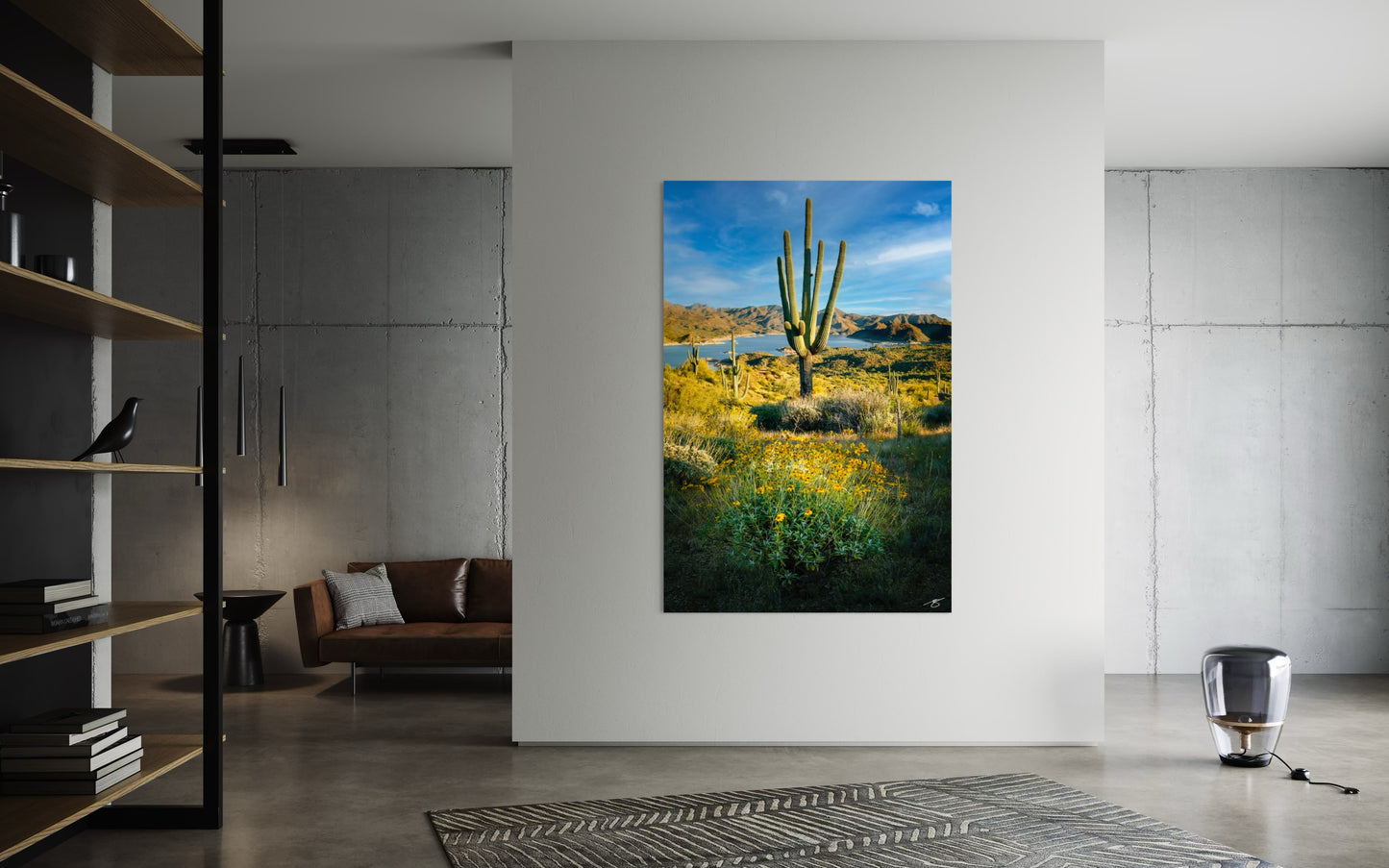 Modern interior with a large desert landscape painting on the wall.