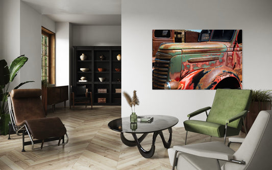Modern living room with a vintage truck painting on the wall.