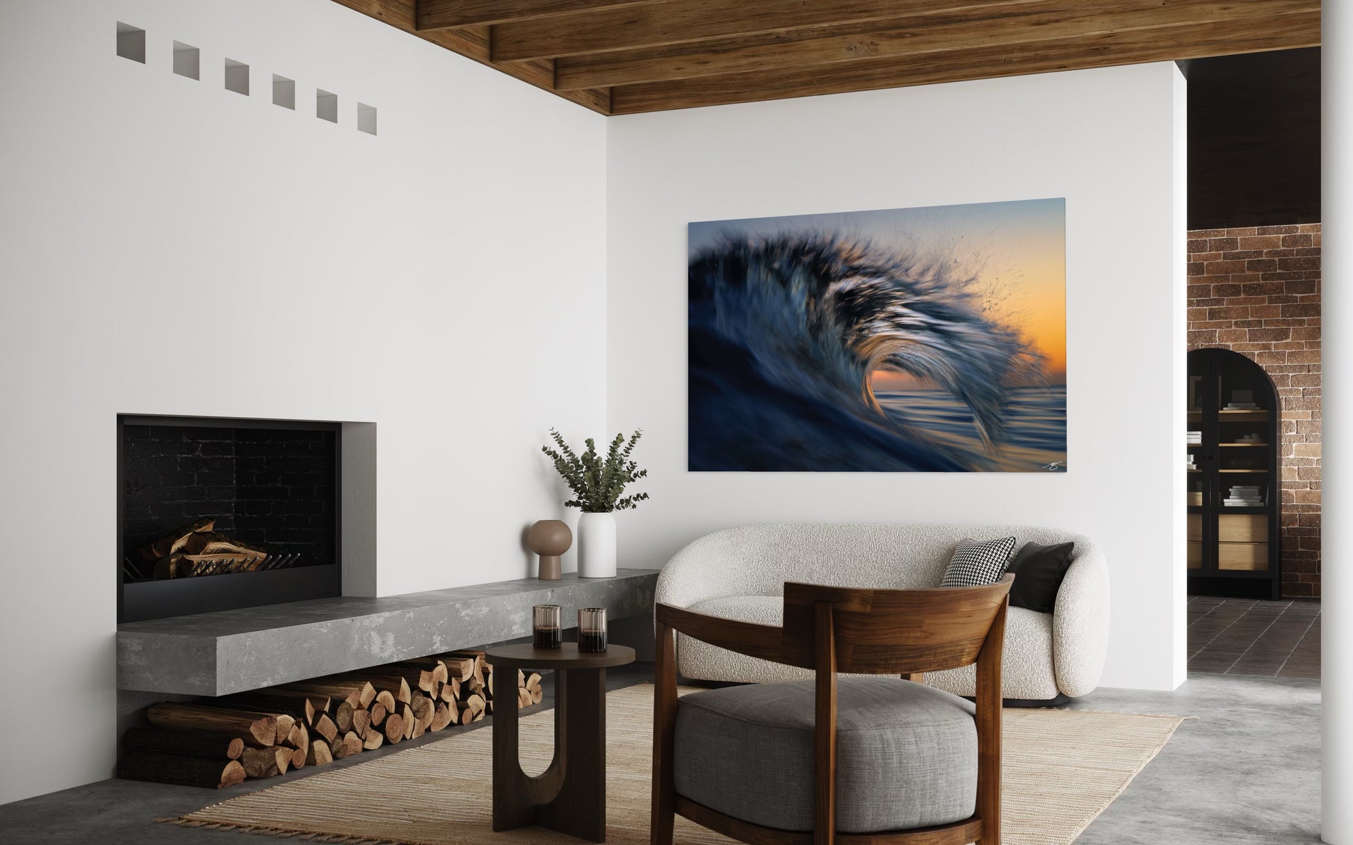 Modern living room with a large abstract painting of a wave on the wall.