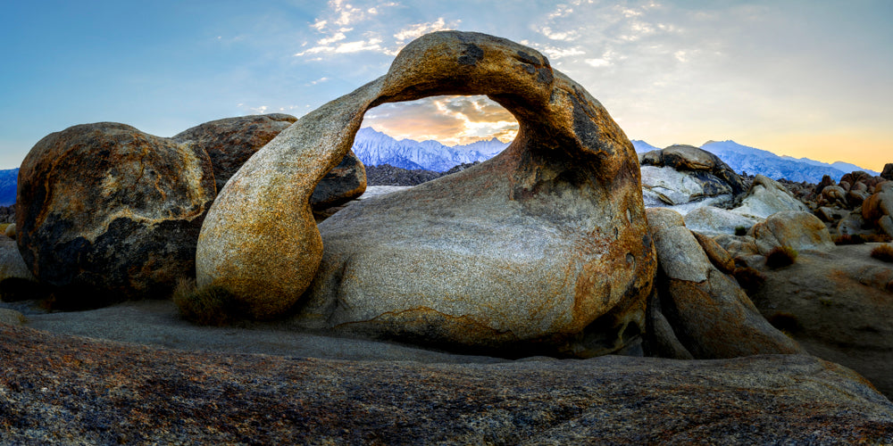 Mobius Arch framing Sierra Nevada mountains at sunrise in Alabama Hills, fine art desert landscape by Beau Jesse Johnston.