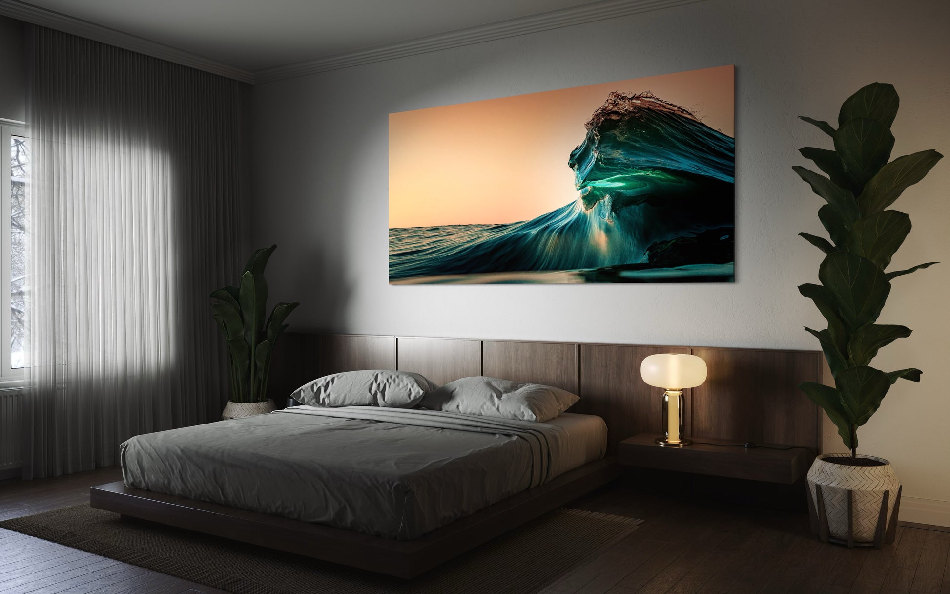 Dramatic teal wave crest rising at sunset with warm golden light illuminating the ocean surface.