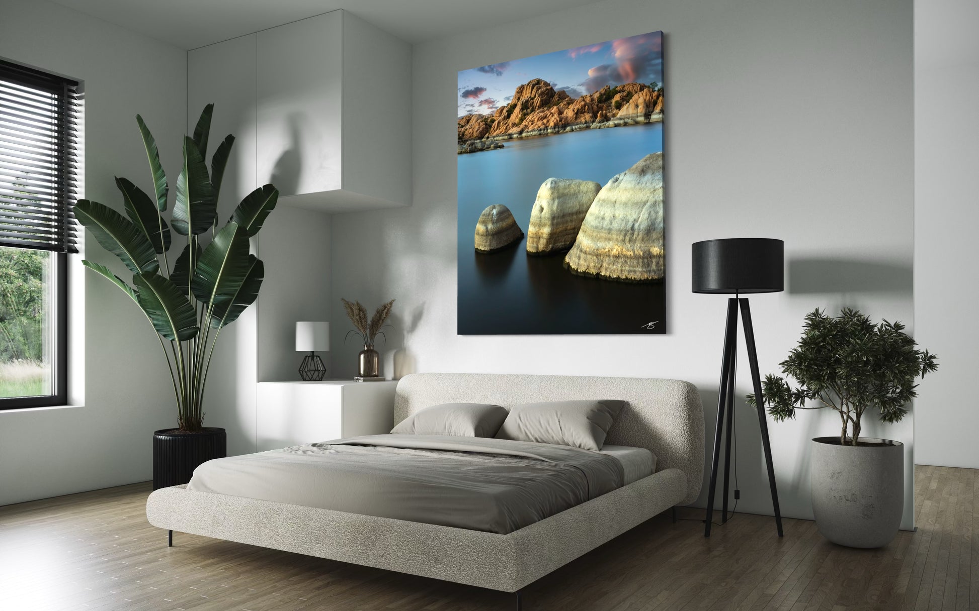 Long-exposure sunset view of Watson Lake’s Granite Dells with smooth water and rounded desert rock formations in soft light.