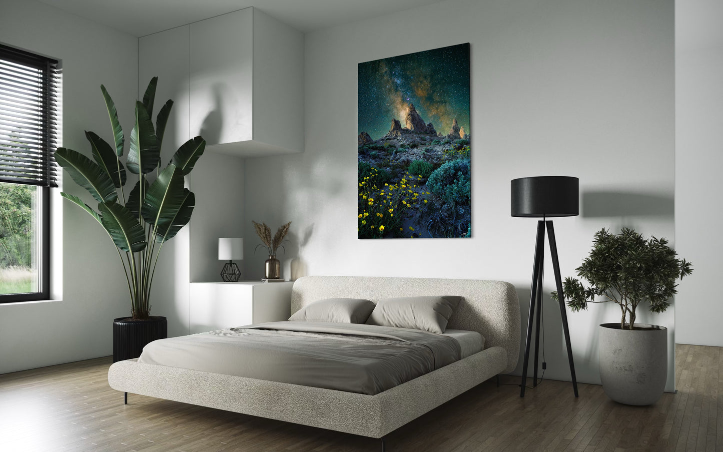Modern bedroom with a bed, lamp, and wall art