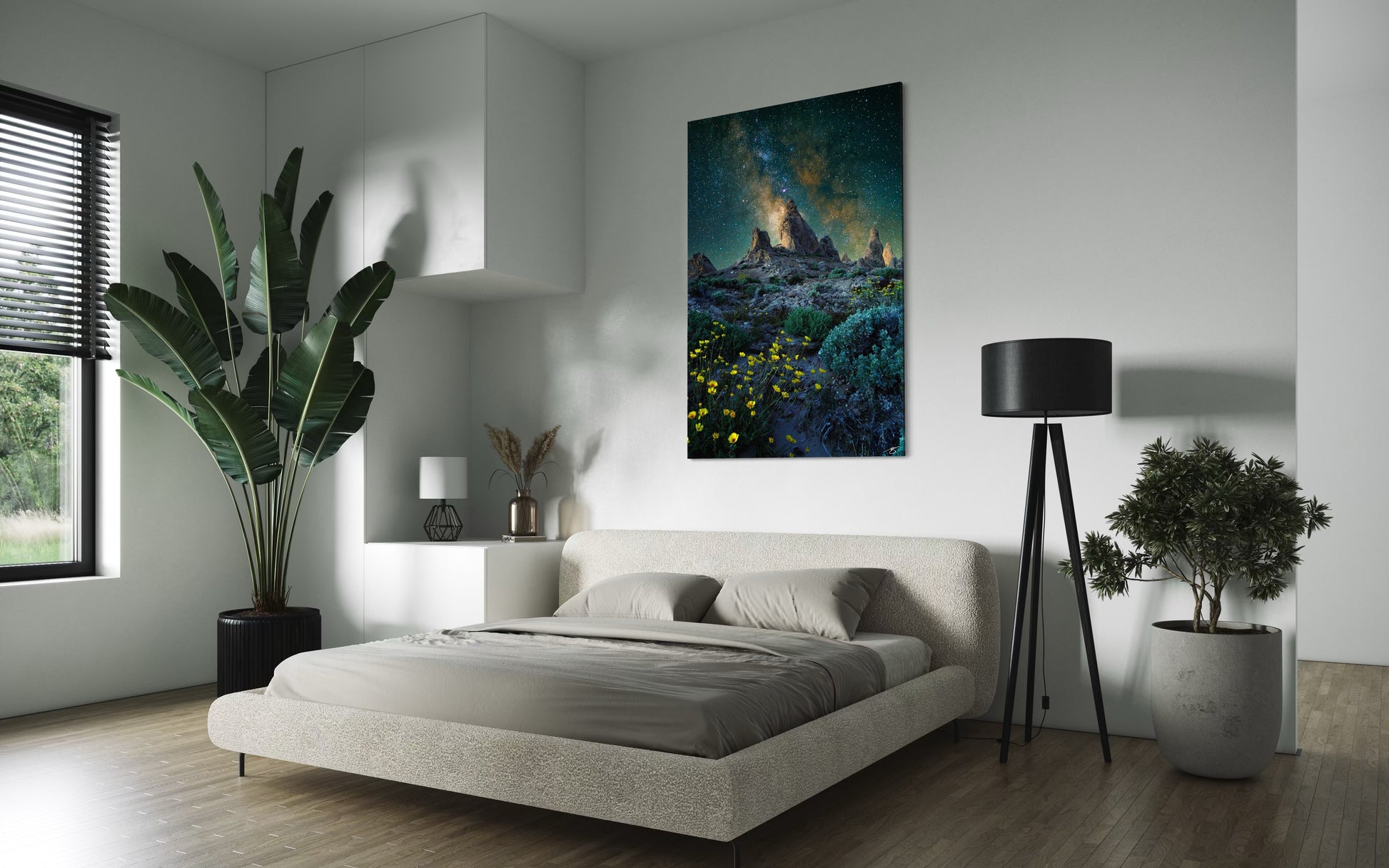Modern bedroom with a bed, lamp, and wall art