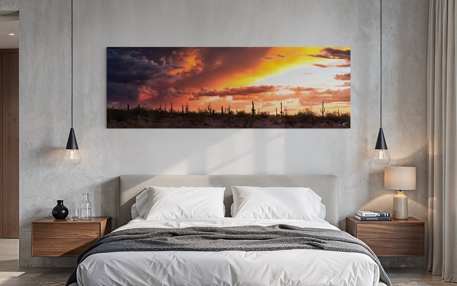 Monsoon Divide fine art photograph displayed above a modern bedroom bed featuring dramatic Arizona monsoon clouds and sunset light over the Sonoran Desert