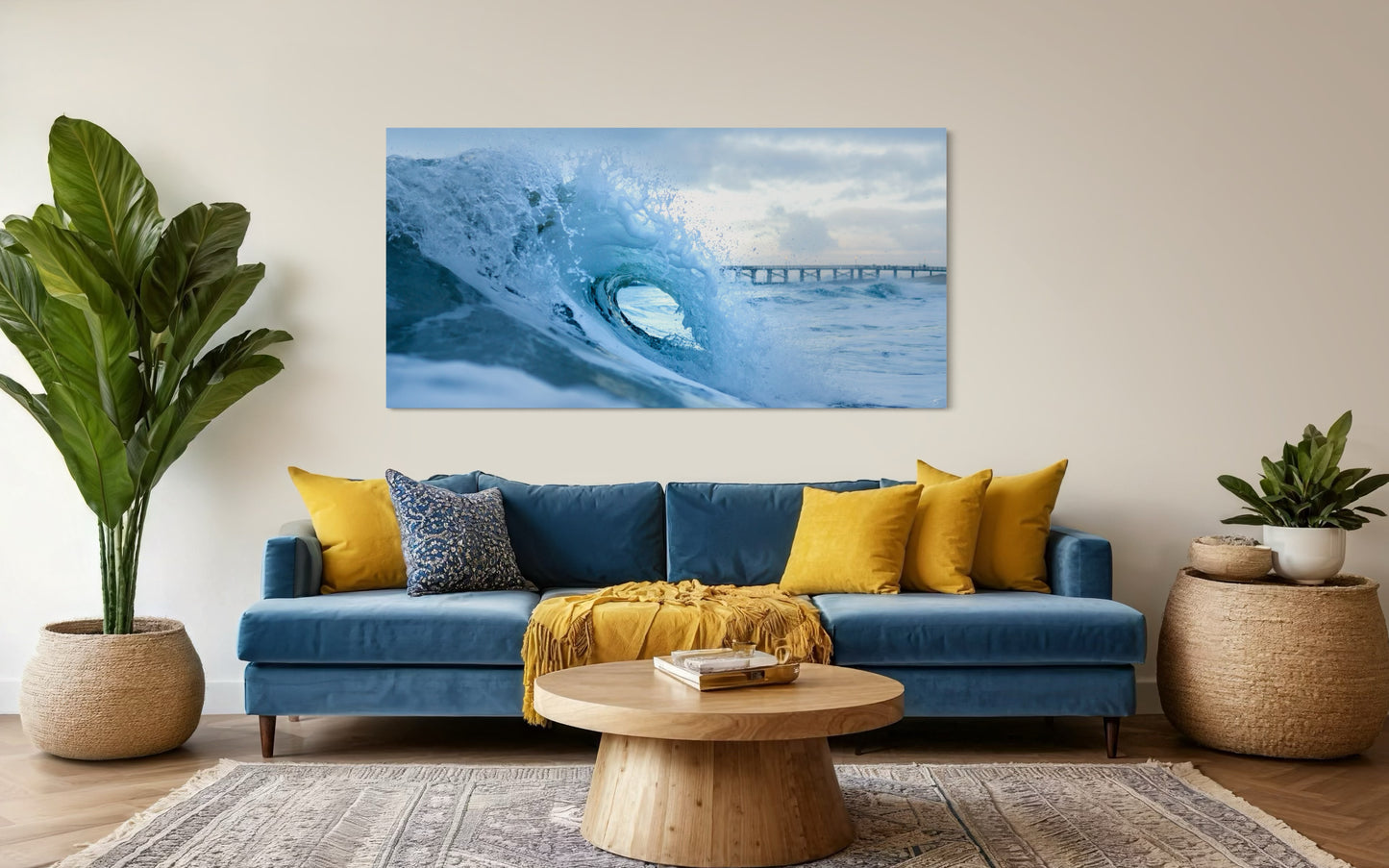 Ocean wave forming a blue barrel at sunrise with a pier in the background under soft coastal light.