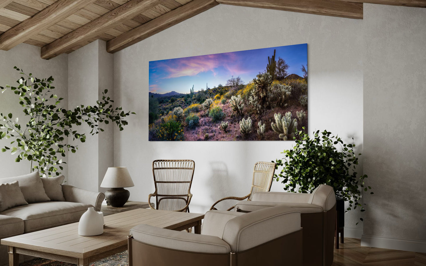 Panoramic Sonoran Desert landscape with blooming wildflowers, glowing cholla, tall saguaros, and a colorful sunset sky.