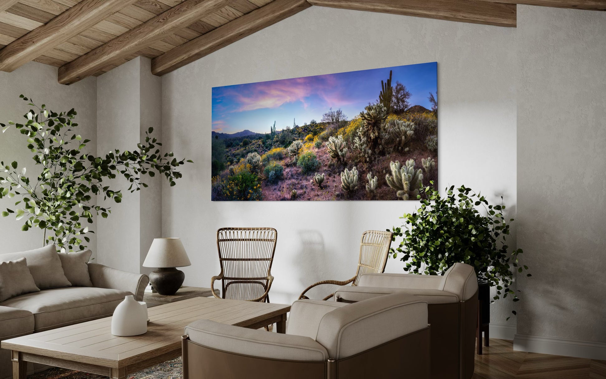 Panoramic Sonoran Desert landscape with blooming wildflowers, glowing cholla, tall saguaros, and a colorful sunset sky.