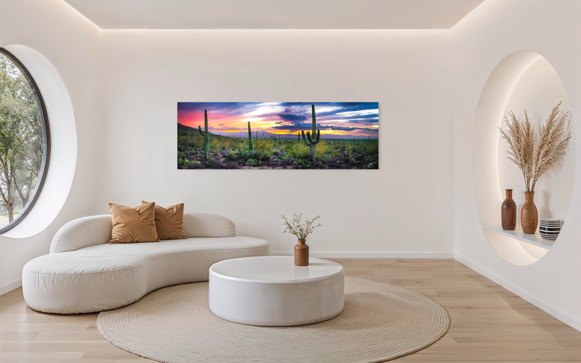 Modern living room with a large wall art depicting a desert landscape.