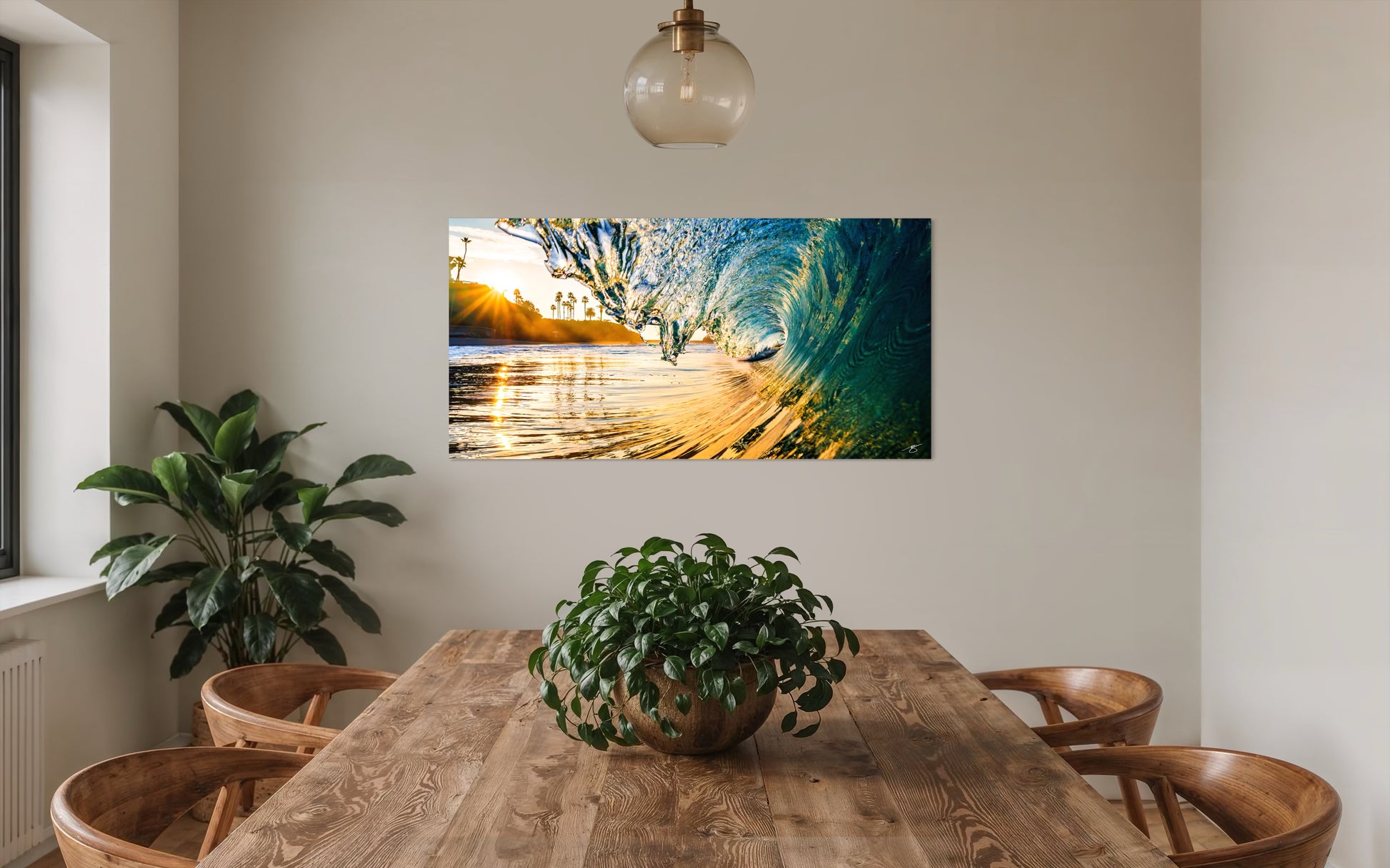 Golden Surge fine art wave photography displayed as statement wall art in a modern dining room