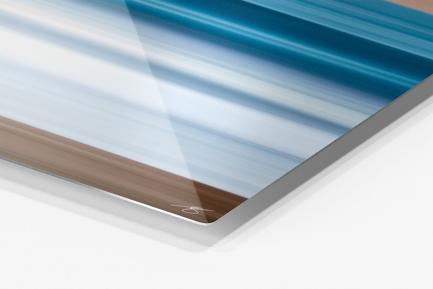 Close-up detail of the Quiet Current aluminum print showing the glossy archival metal finish and rounded corner